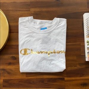 Champion - gold spell-out tshirt (L)